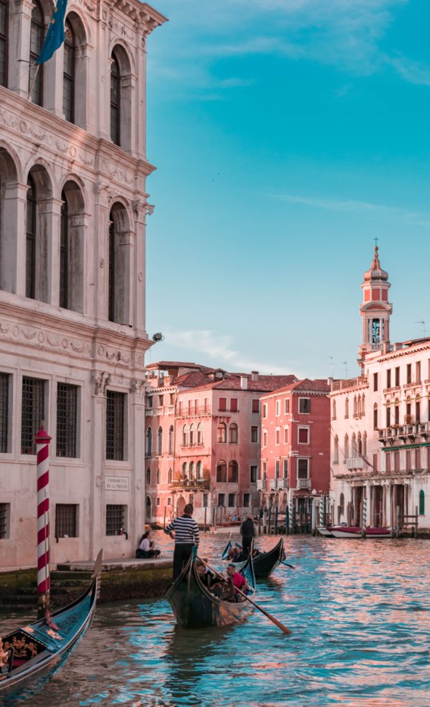 Gondola ride Venice canal blue sky topdeck europe italy