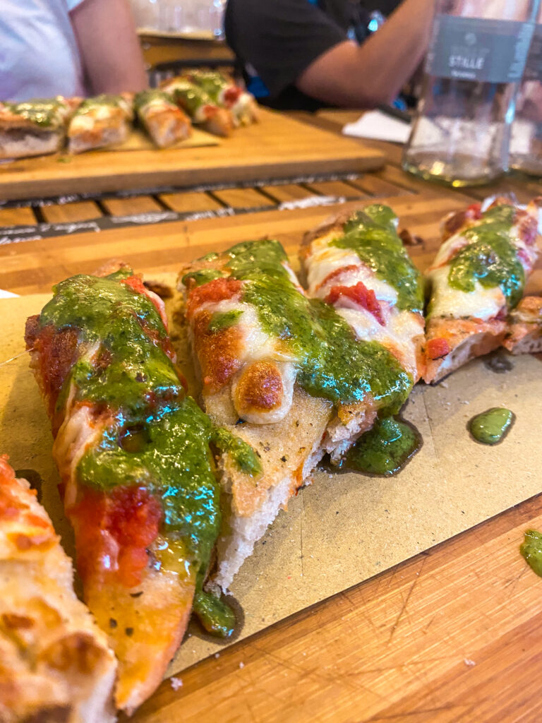 Margherita pizza with pesto topping