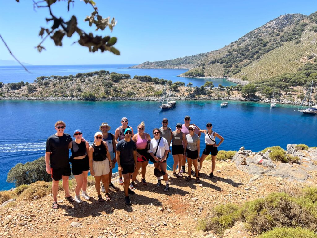 Group of people posing by the sea in Turkey