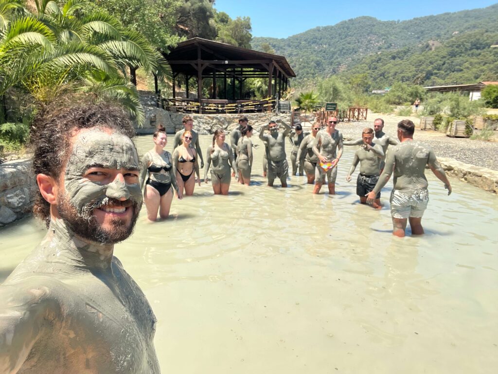 Group of people in a mud bath in Turkey